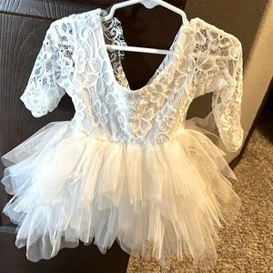 This elegant dress was only worn once for my daughter’s baptism.